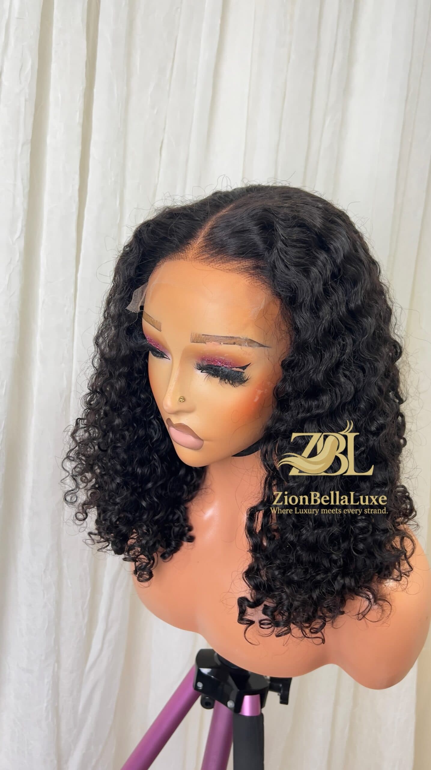 Tumi Curls: Natural black Burmese Curls with 5*5 HD Lace 16 inches