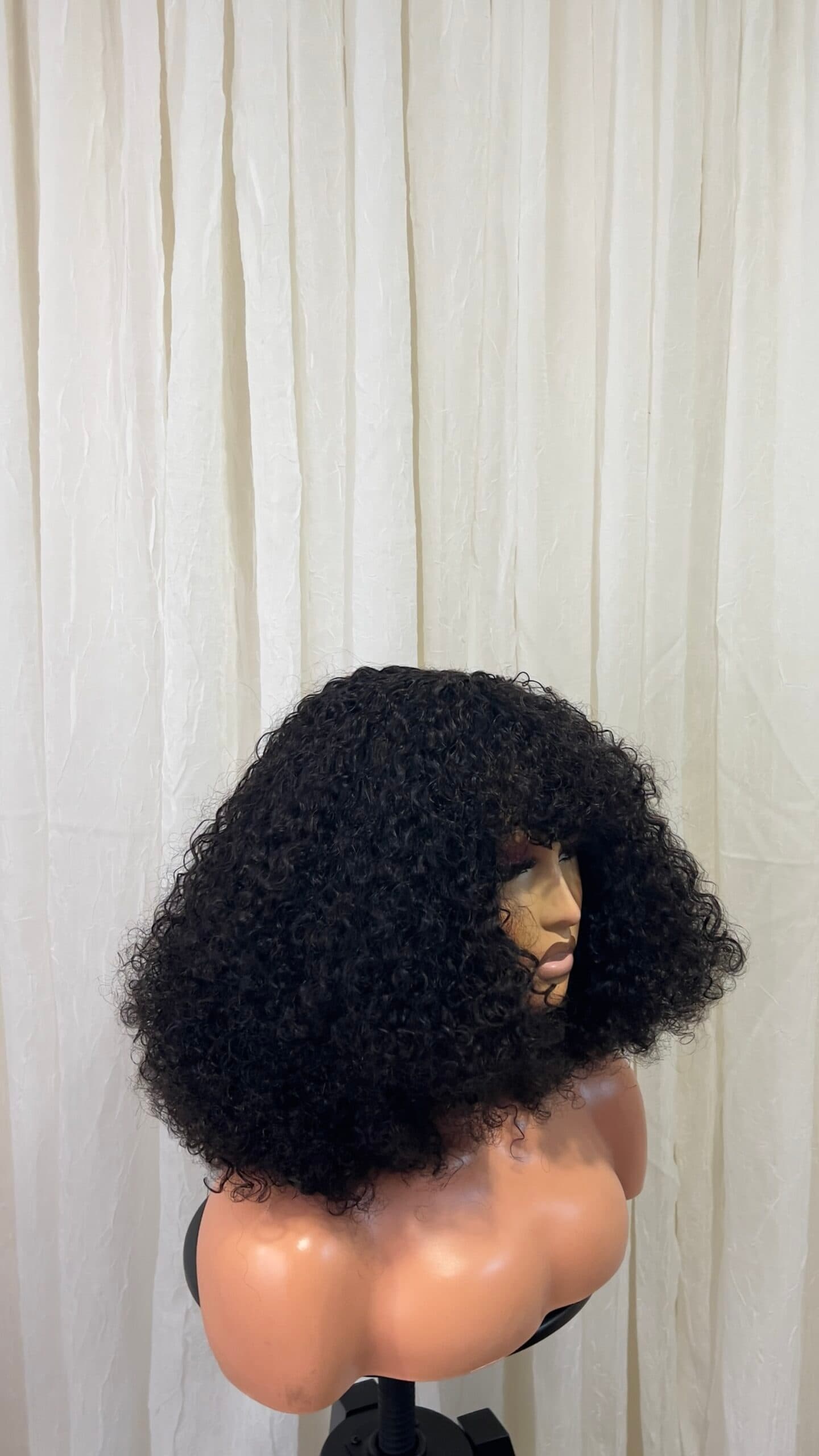 Maya Unit: Curly Wig with bangs